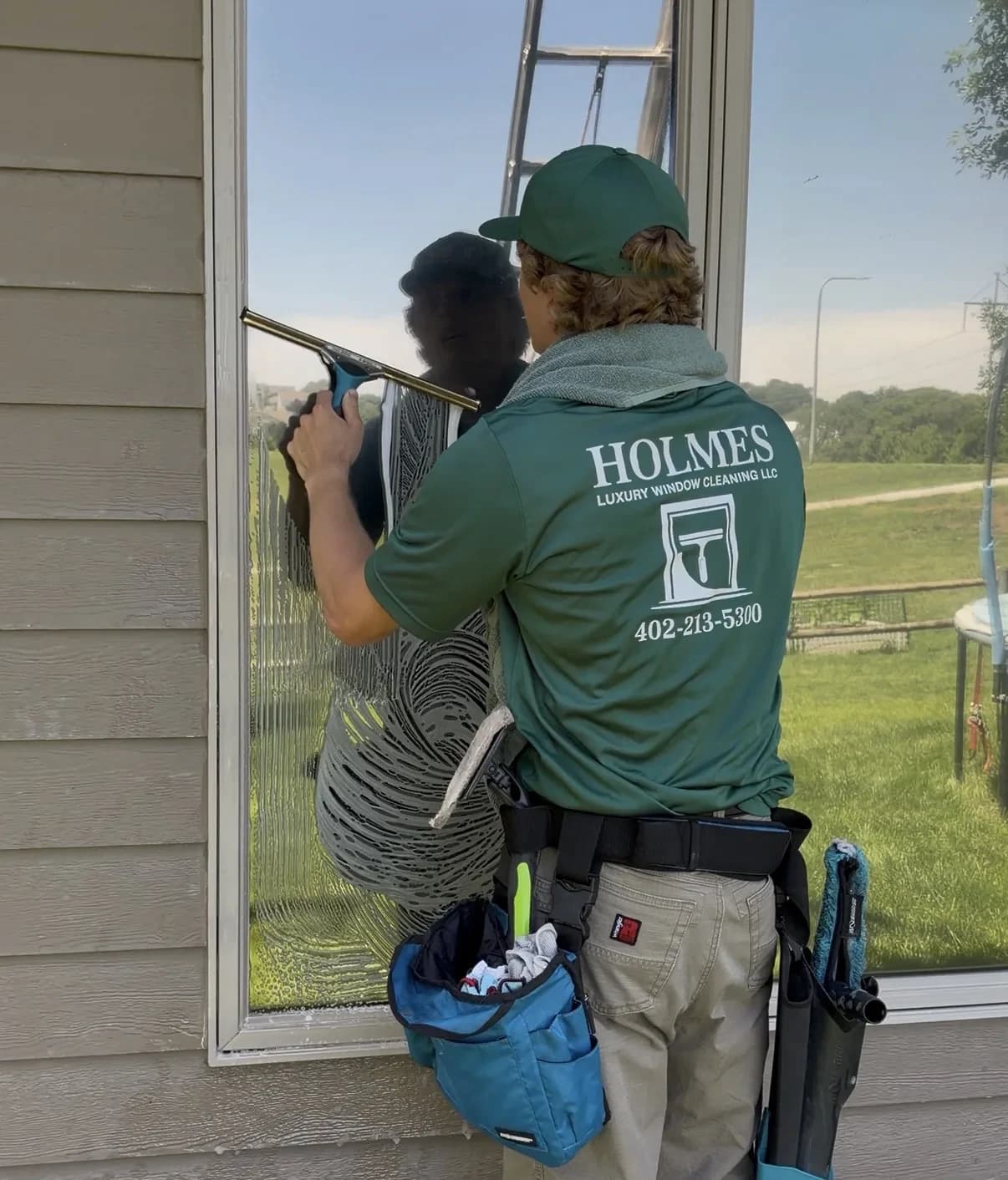 Window cleaning on a luxury Omaha home